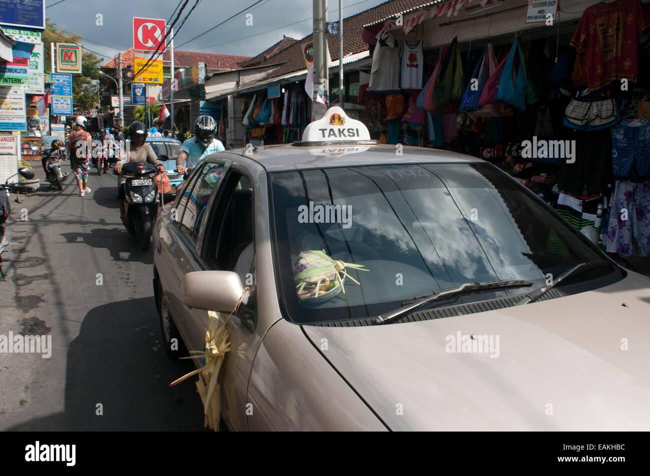 Taxi in the Streets of Kuta. Indonesia, Bali, touristic streets of Kuta.  Bali. Most of Lombok's south coasts offer surf-seekers Stock Photo