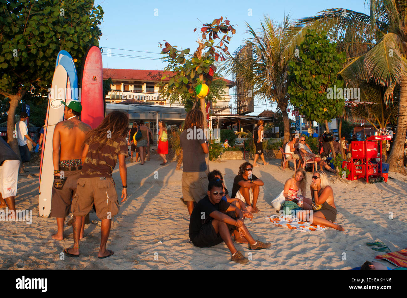 Beach of Kuta at sunset. Surfing lessons. Bali. Kuta is a coastal town in the south of the island of Lombok in Indonesia. The sc Stock Photo
