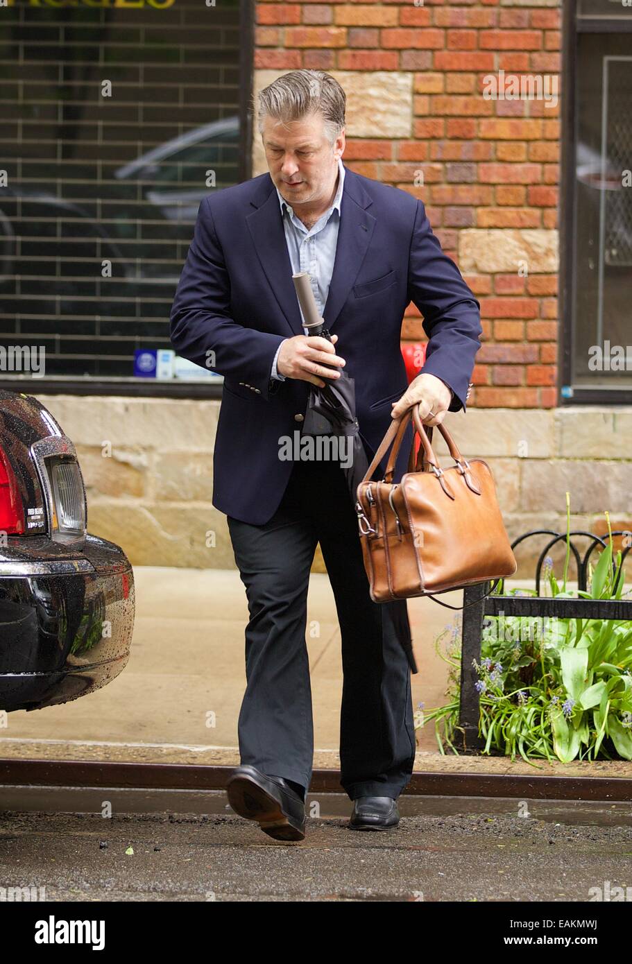 Alec Baldwin seen outside his apartment with his wife Hilaria and baby daughter Carmen in New