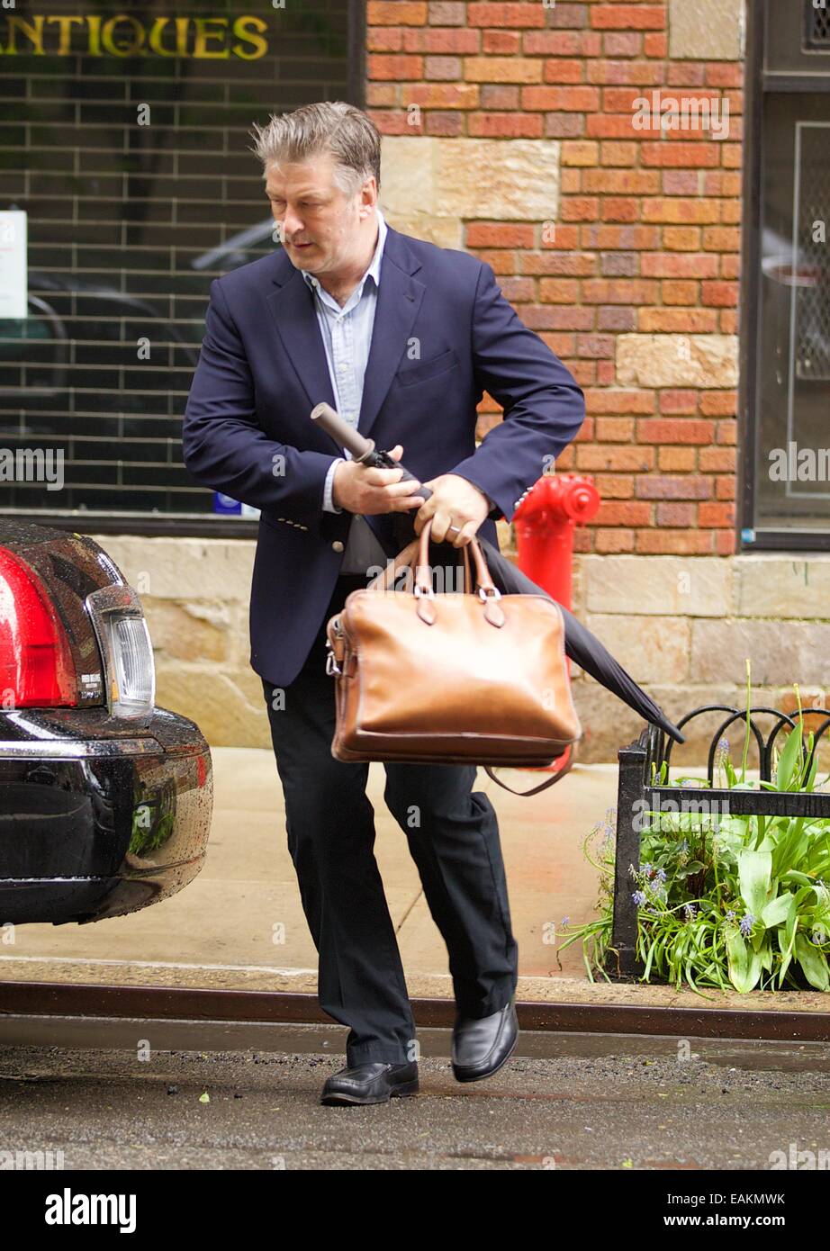 Alec Baldwin seen outside his apartment with his wife Hilaria and baby daughter Carmen in New