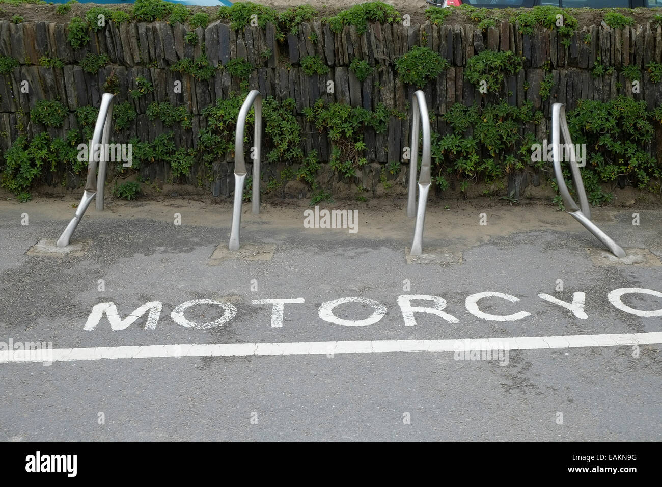 Damaged motorcycle racks at Portowan Stock Photo - Alamy