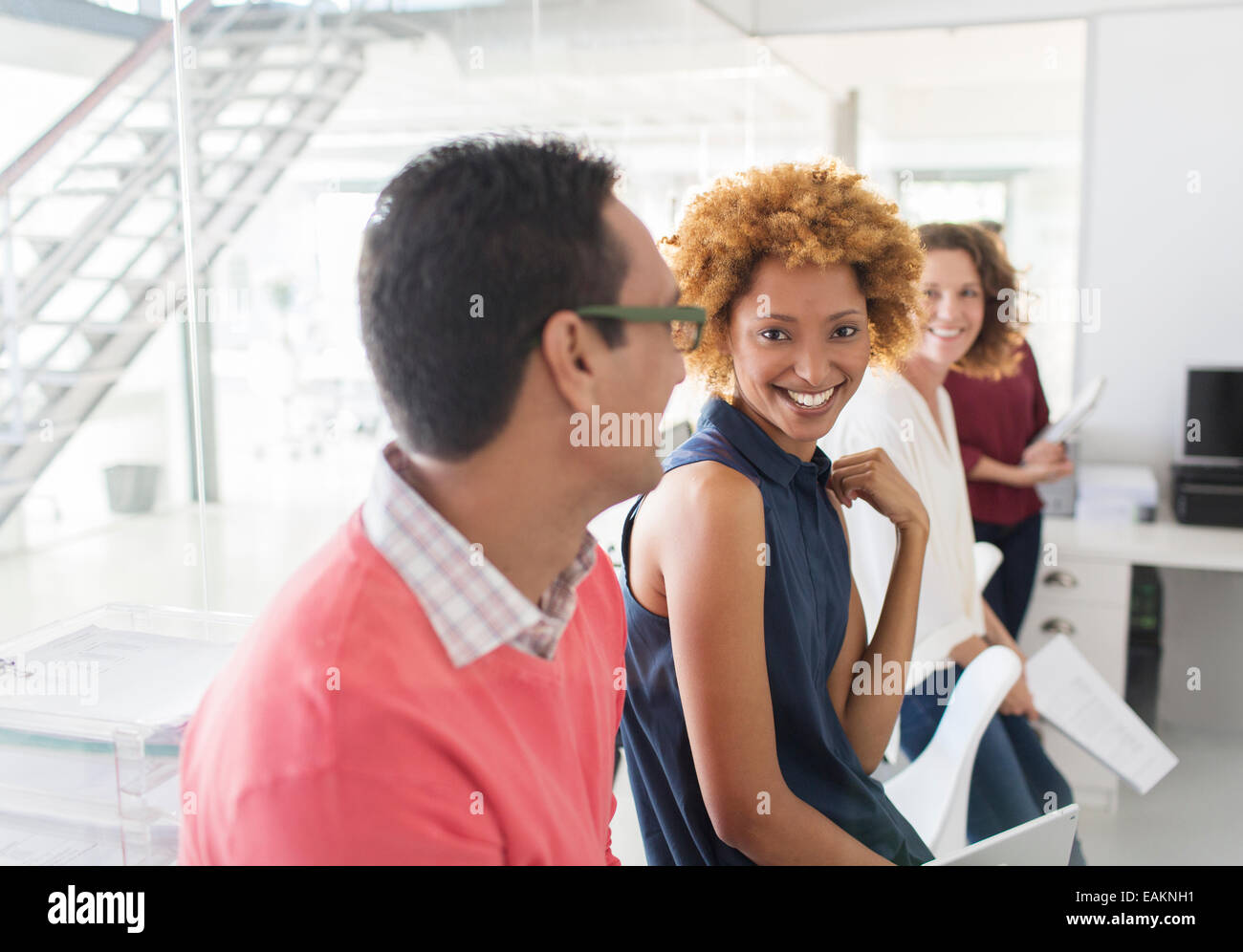 Group of smiling business people having meeting in office Stock Photo ...