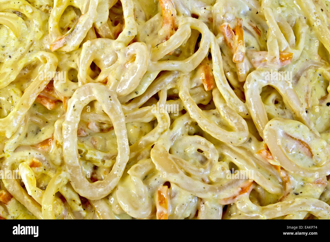 Calamari in cream sauce Stock Photo Alamy