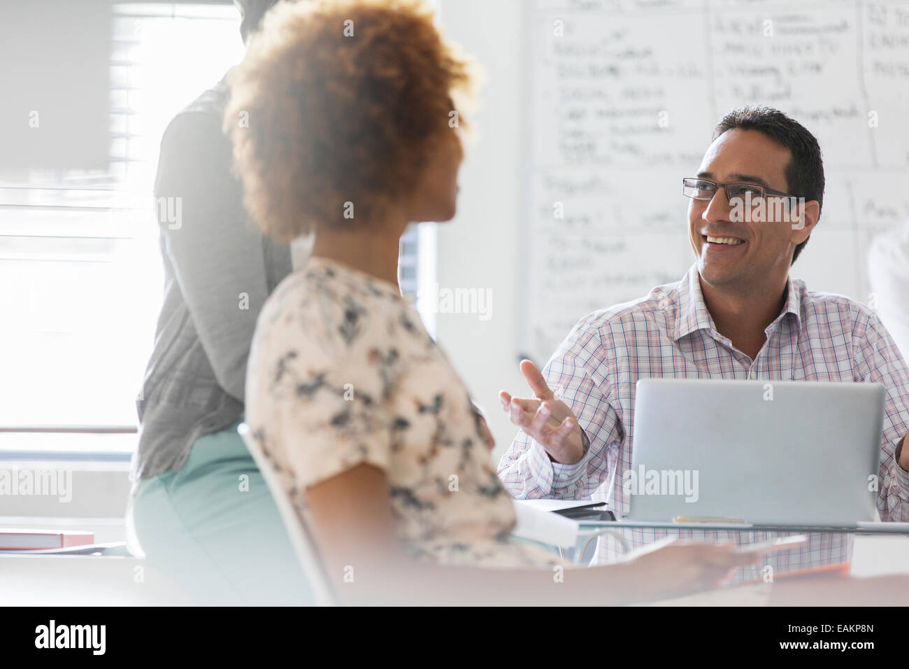 People having meeting in office Stock Photo - Alamy