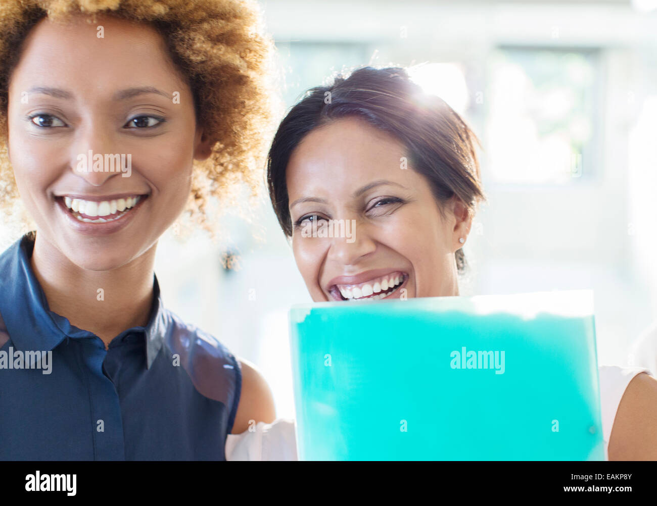 Portrait of two businesswomen laughing Stock Photo