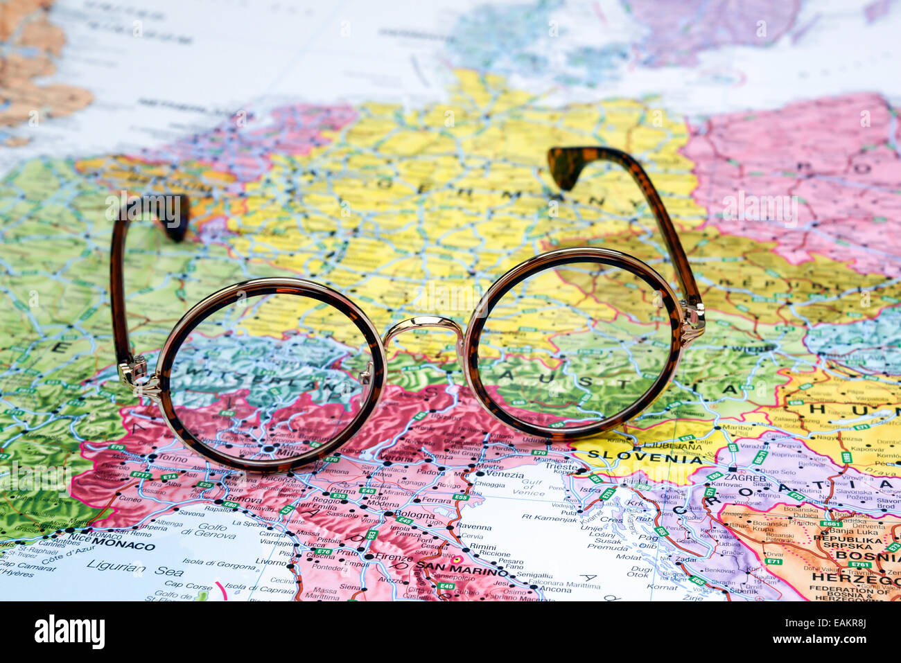Glasses on a map of europe - Switzerland Stock Photo