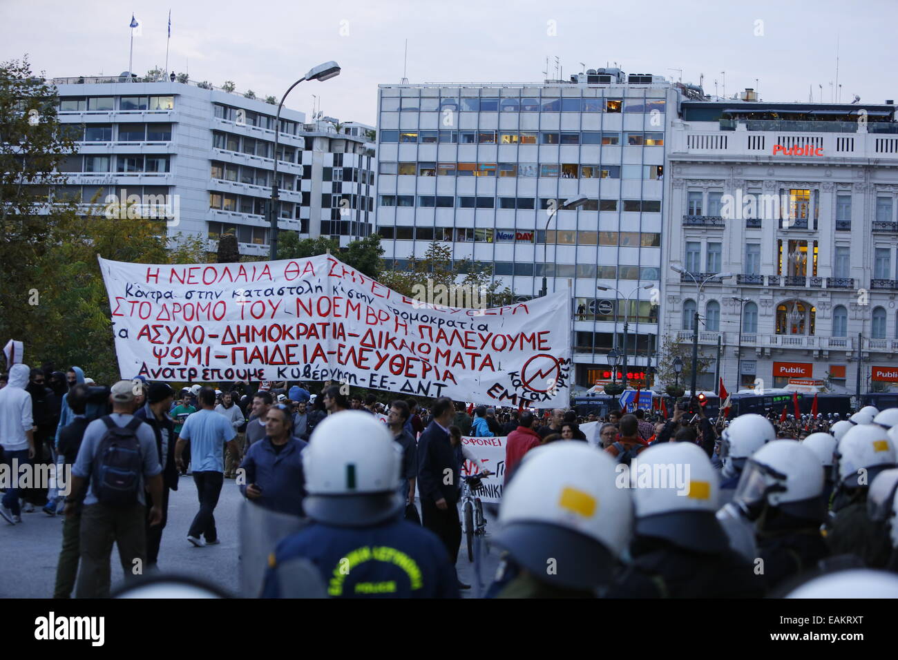 Athens, Greece. 17th Nov, 2014. Police officers in full riot gear watch ...