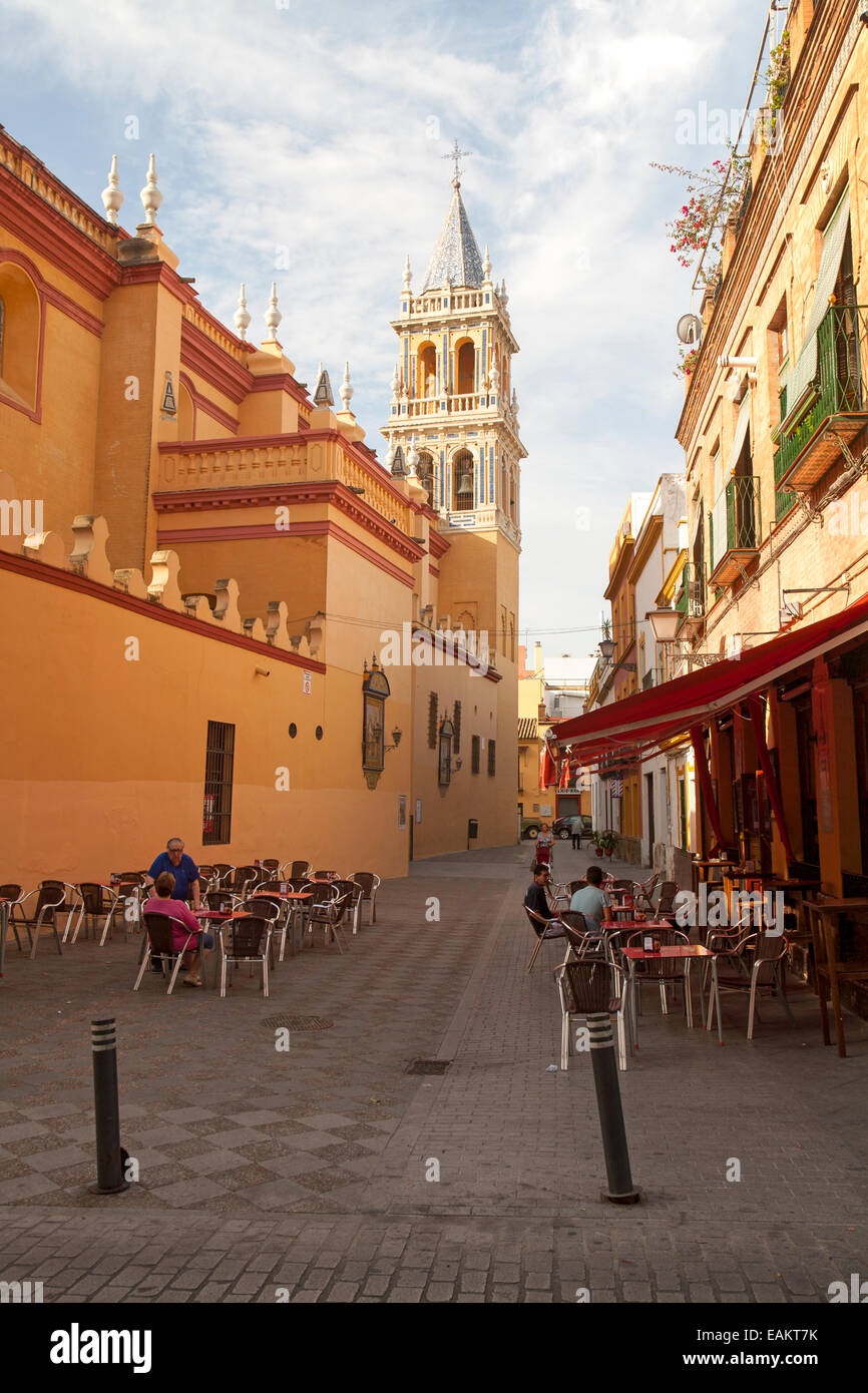 Cafe and alleyway by the Iglesia de Santa Ana, Triana, Seville, Spain Stock Photo