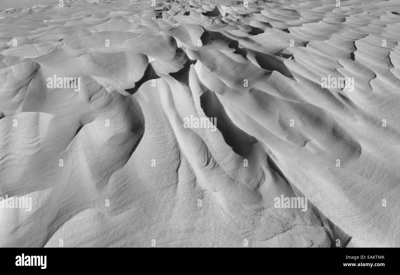 Snow covering earth by waves Stock Photo