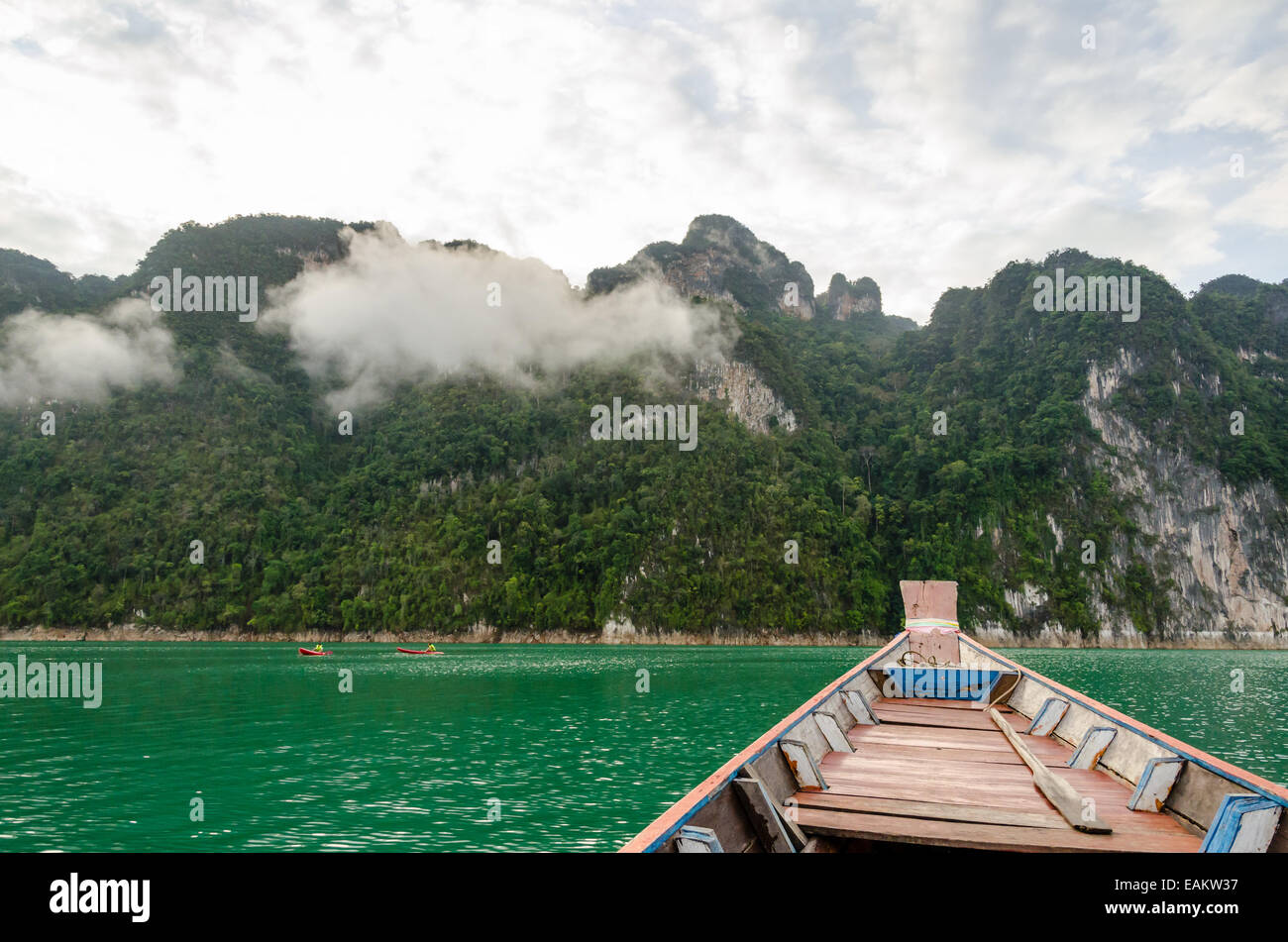 Travel by small boats in the morning at Ratchaprapha Dam, Khao Sok National Park, Surat Thani Province, Thailand Stock Photo