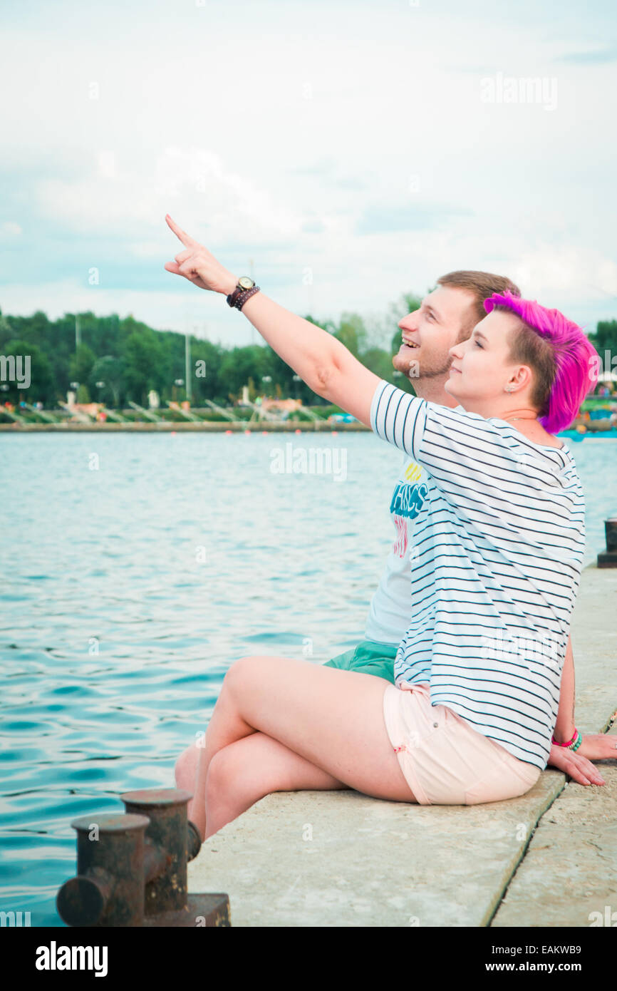 Man woman couple sitting hi-res stock photography and images - Alamy