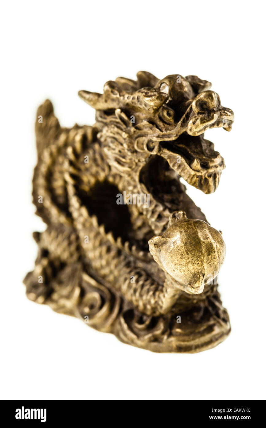 Golden chinese dragon sculpture isolated over a pure white background Stock Photo