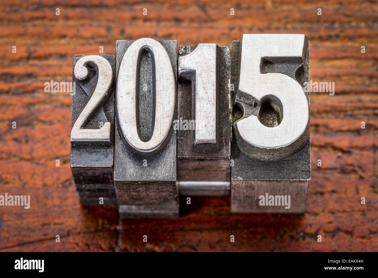 2015  - New Year concept  - text in vintage metal type over grunge wood Stock Photo
