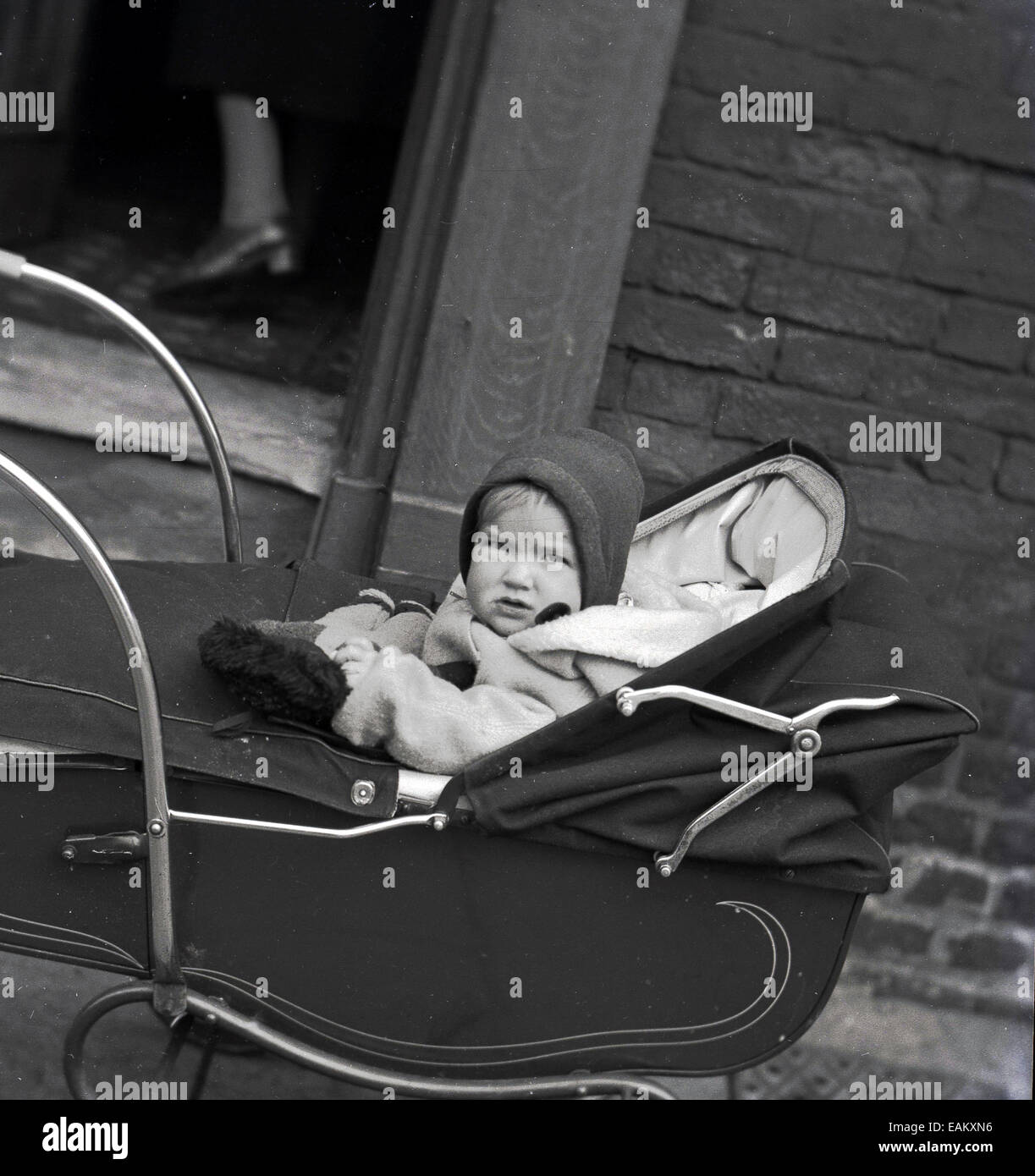 when can baby sit upright in pram