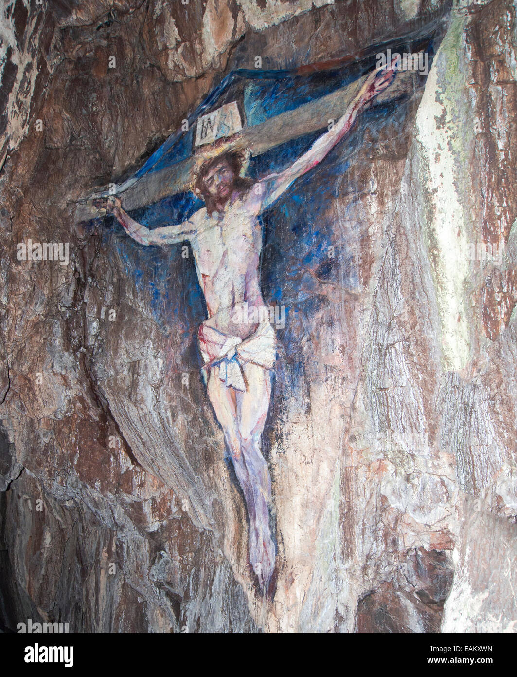 Cave painting of Jesus Christ on the cross Stock Photo