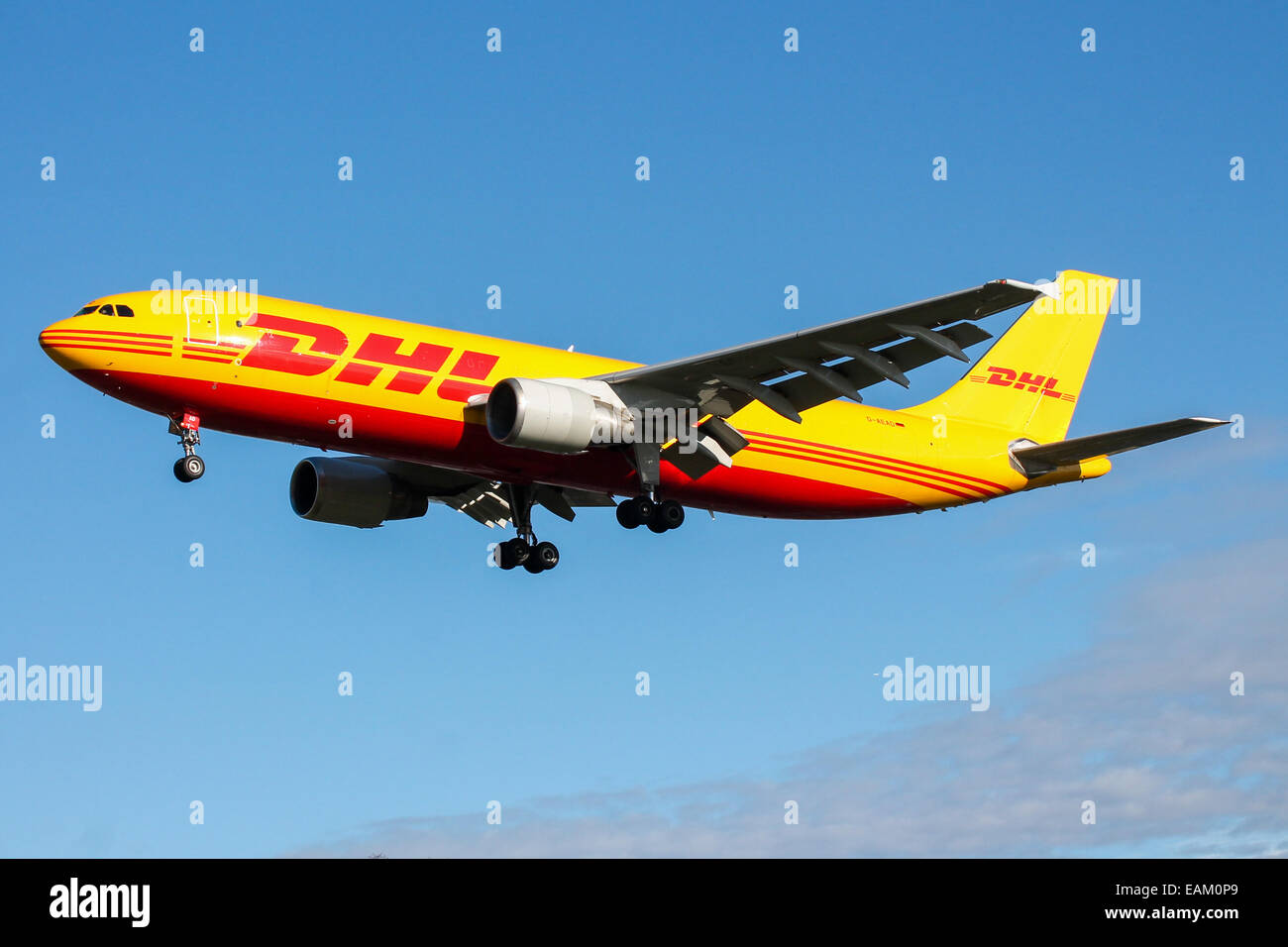 DHL Airbus A300 approaches runway 27L at London Heathrow Airport. Stock Photo