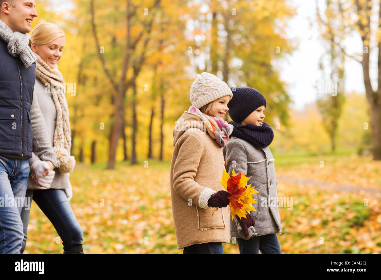 happy family in autumn park Stock Photo - Alamy