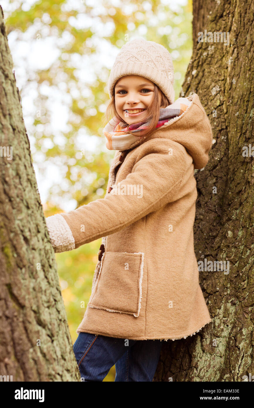 smiling little girl autumn in park Stock Photo - Alamy