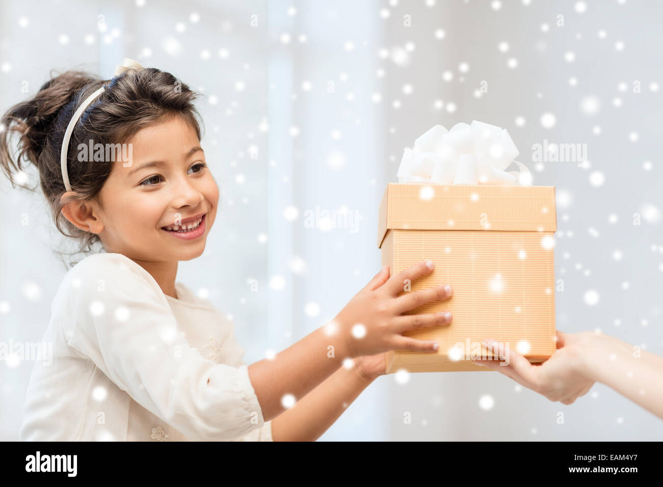 smiling little girl with gift box Stock Photo - Alamy