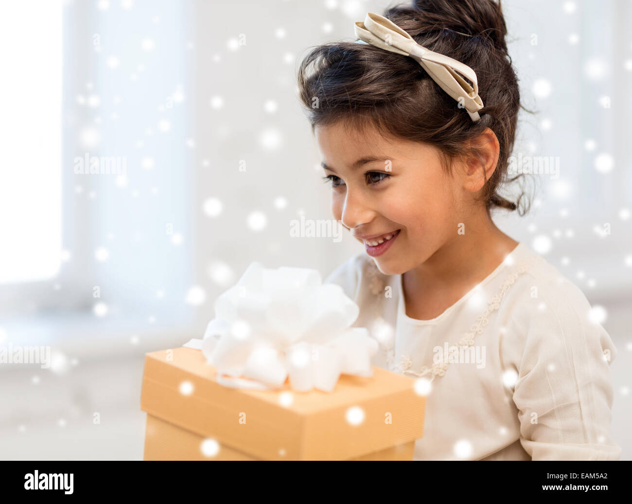 smiling little girl with gift box Stock Photo - Alamy