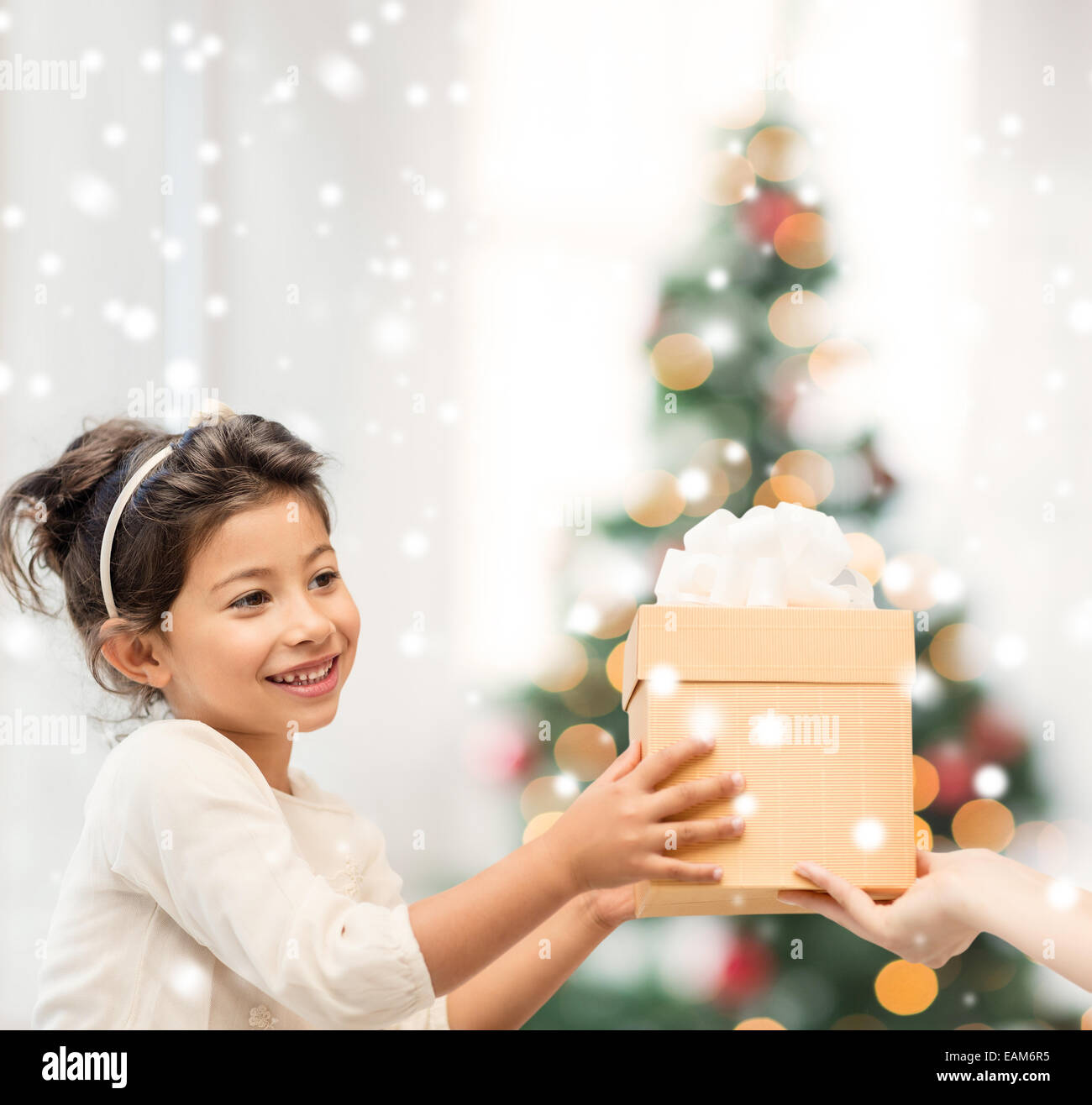 smiling little girl with gift box Stock Photo - Alamy