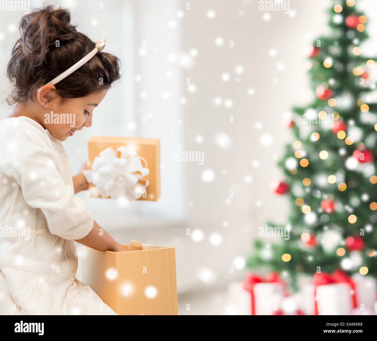 smiling little girl with gift box Stock Photo - Alamy