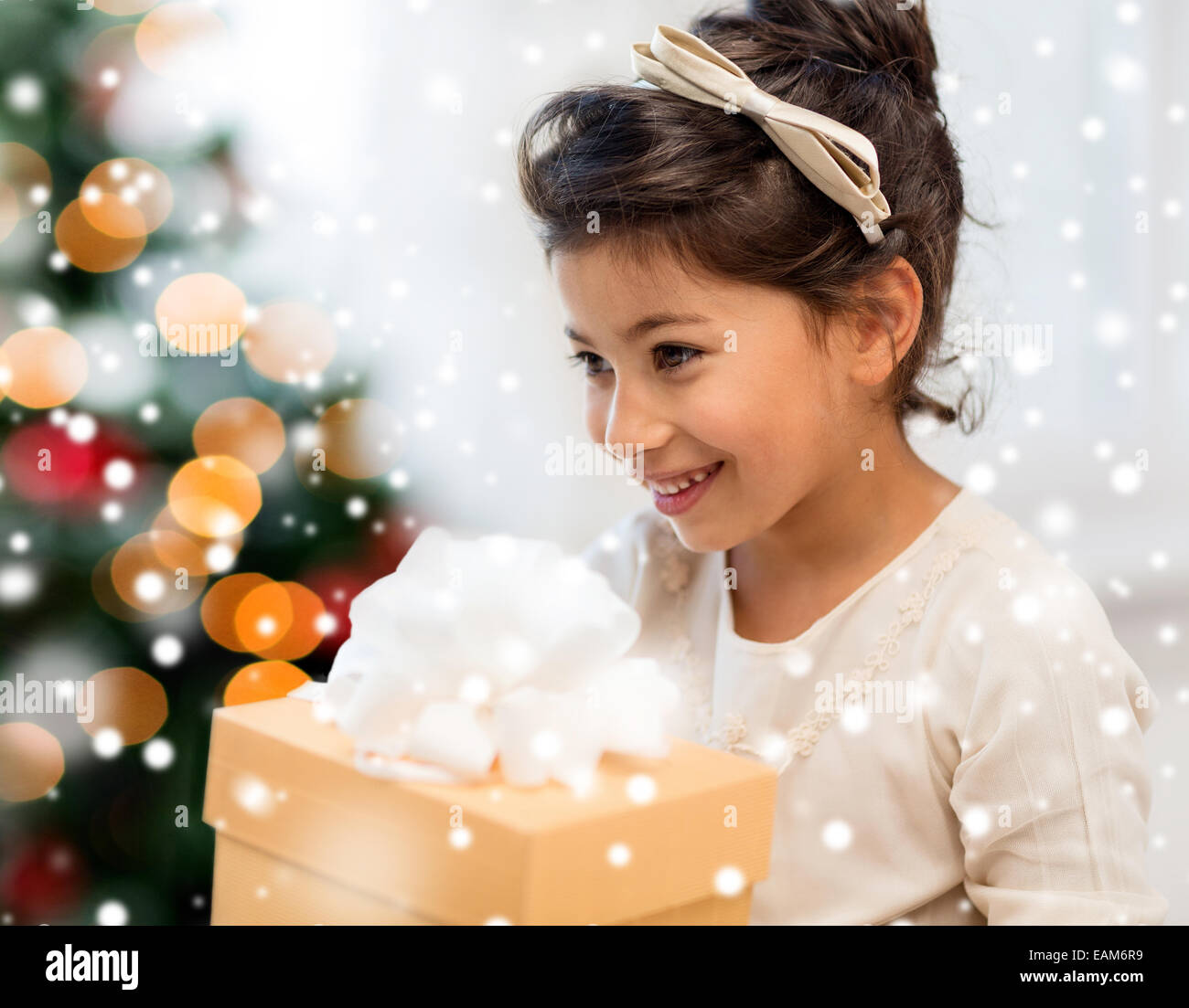 smiling little girl with gift box Stock Photo - Alamy
