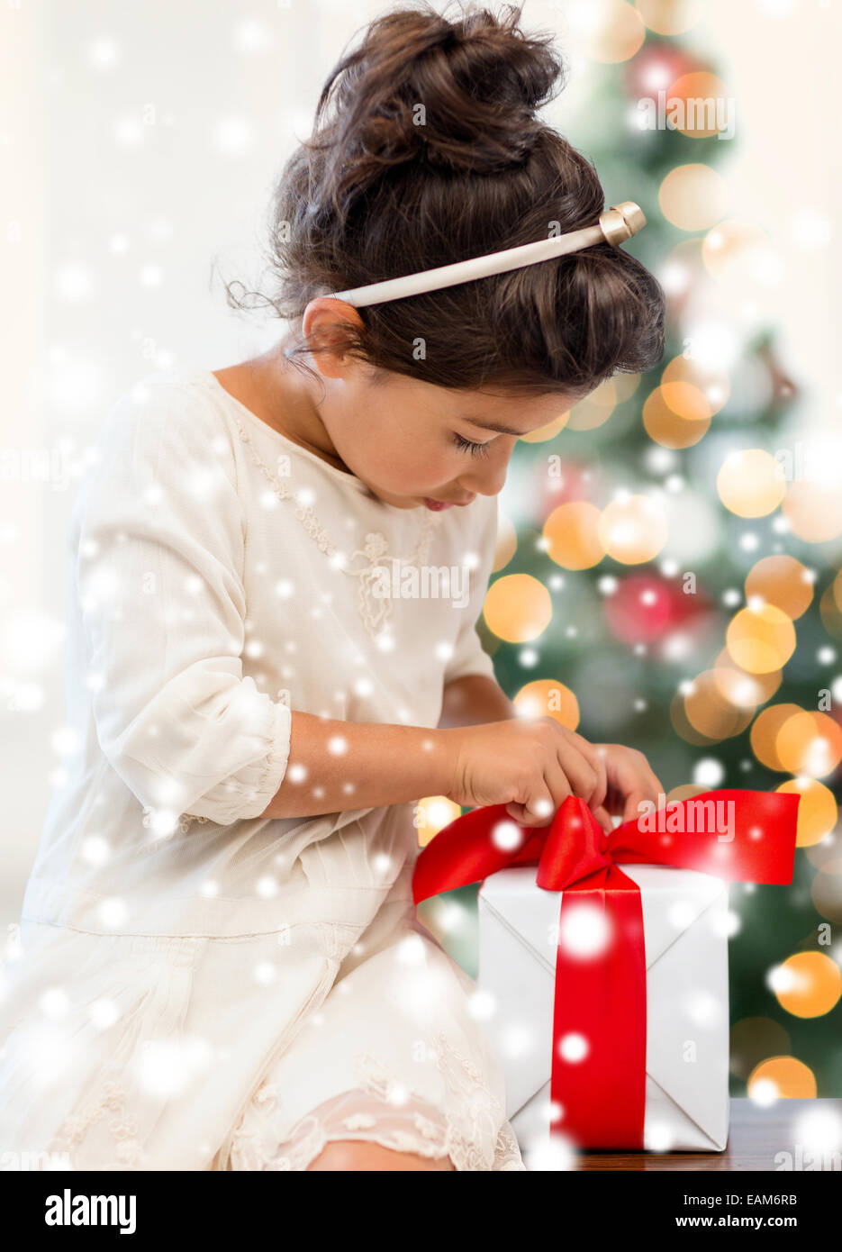 smiling little girl with gift box Stock Photo - Alamy