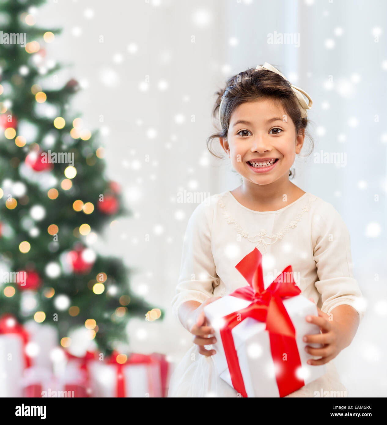 smiling little girl with gift box Stock Photo - Alamy