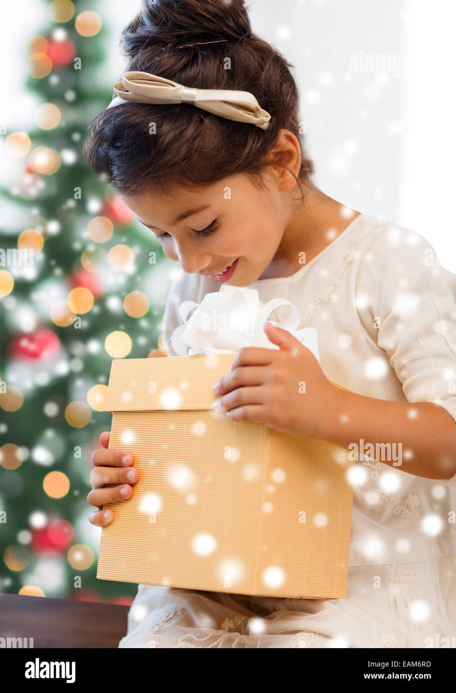 smiling little girl with gift box Stock Photo - Alamy