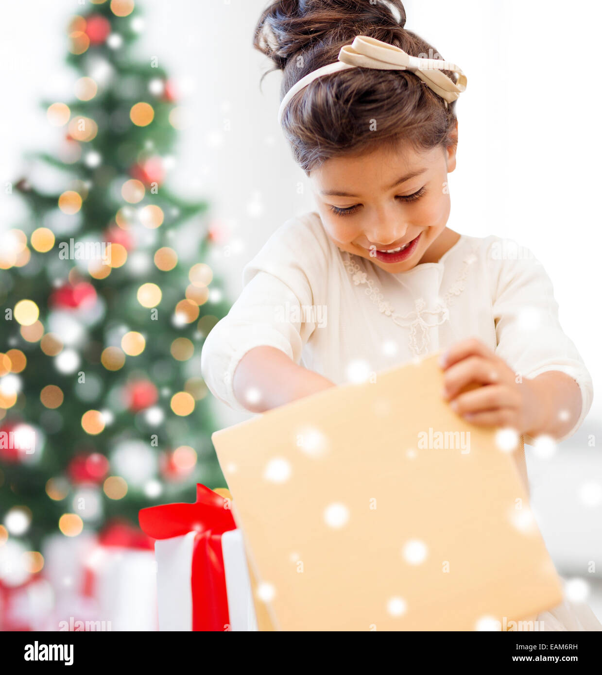 smiling little girl with gift box Stock Photo - Alamy