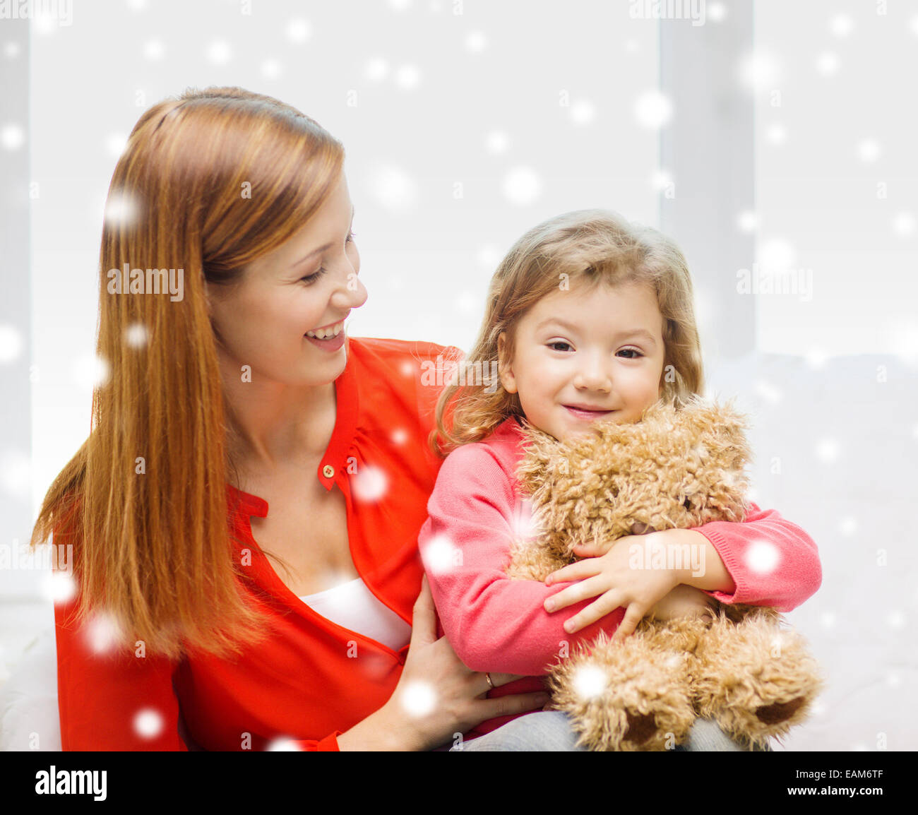 mother and daughter with teddy bear toy Stock Photo - Alamy