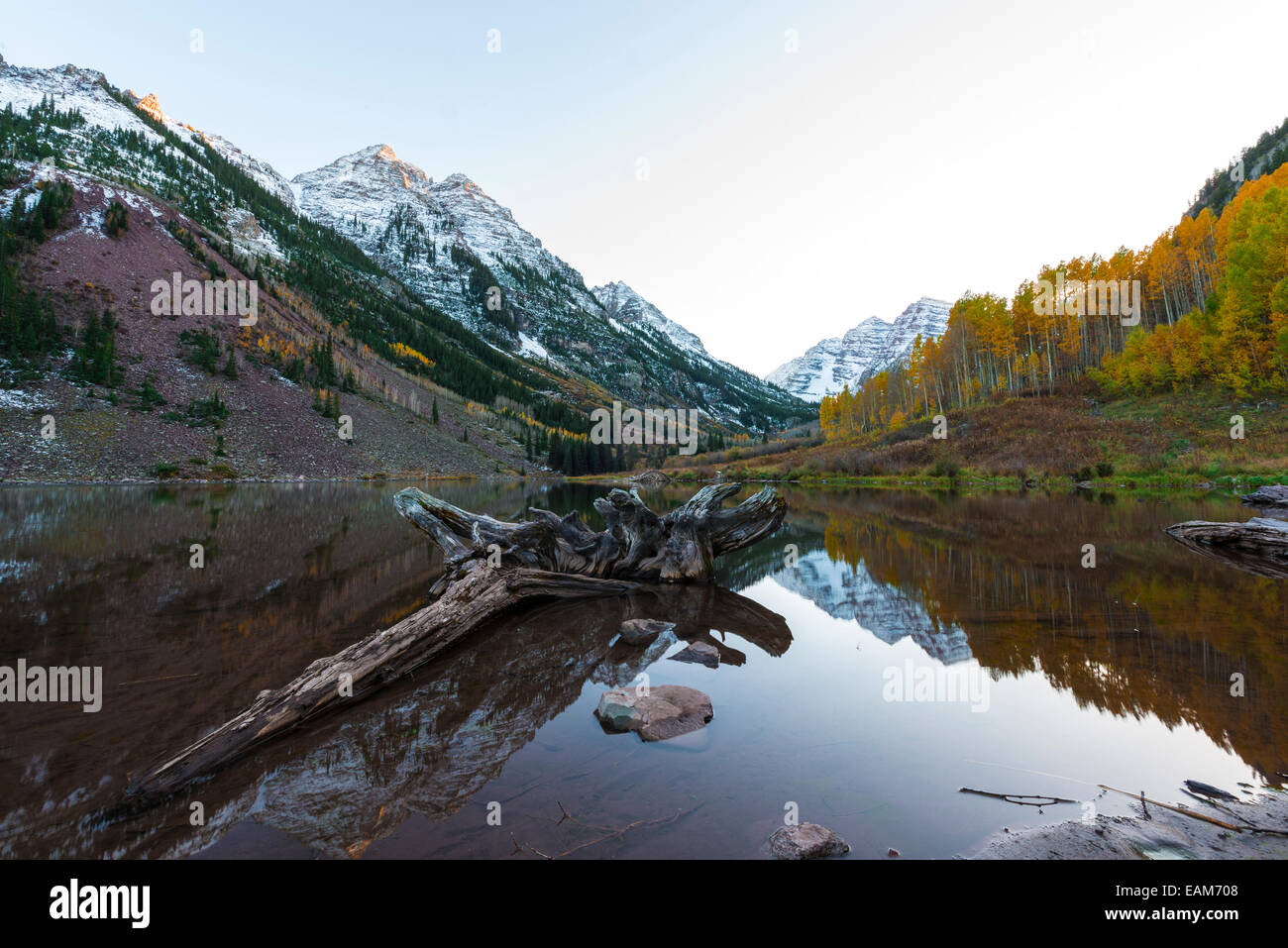 Maroon Bells and its Reflection in the Lake with Fall foliage in Peak at Aspen, Colorado Stock Photo