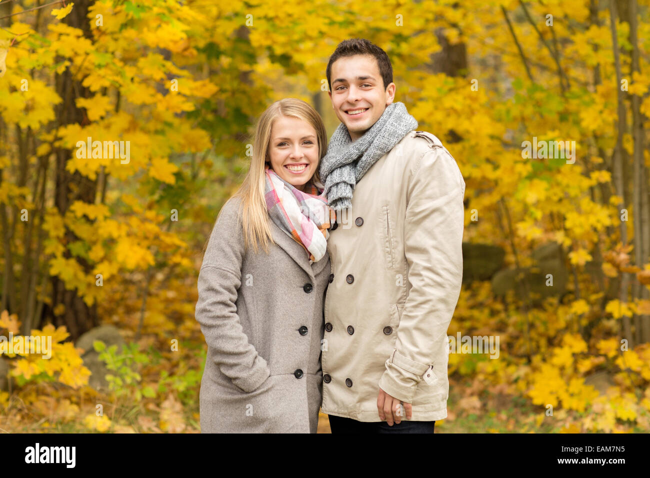 Teenage couple hugging in park hi-res stock photography and images - Alamy
