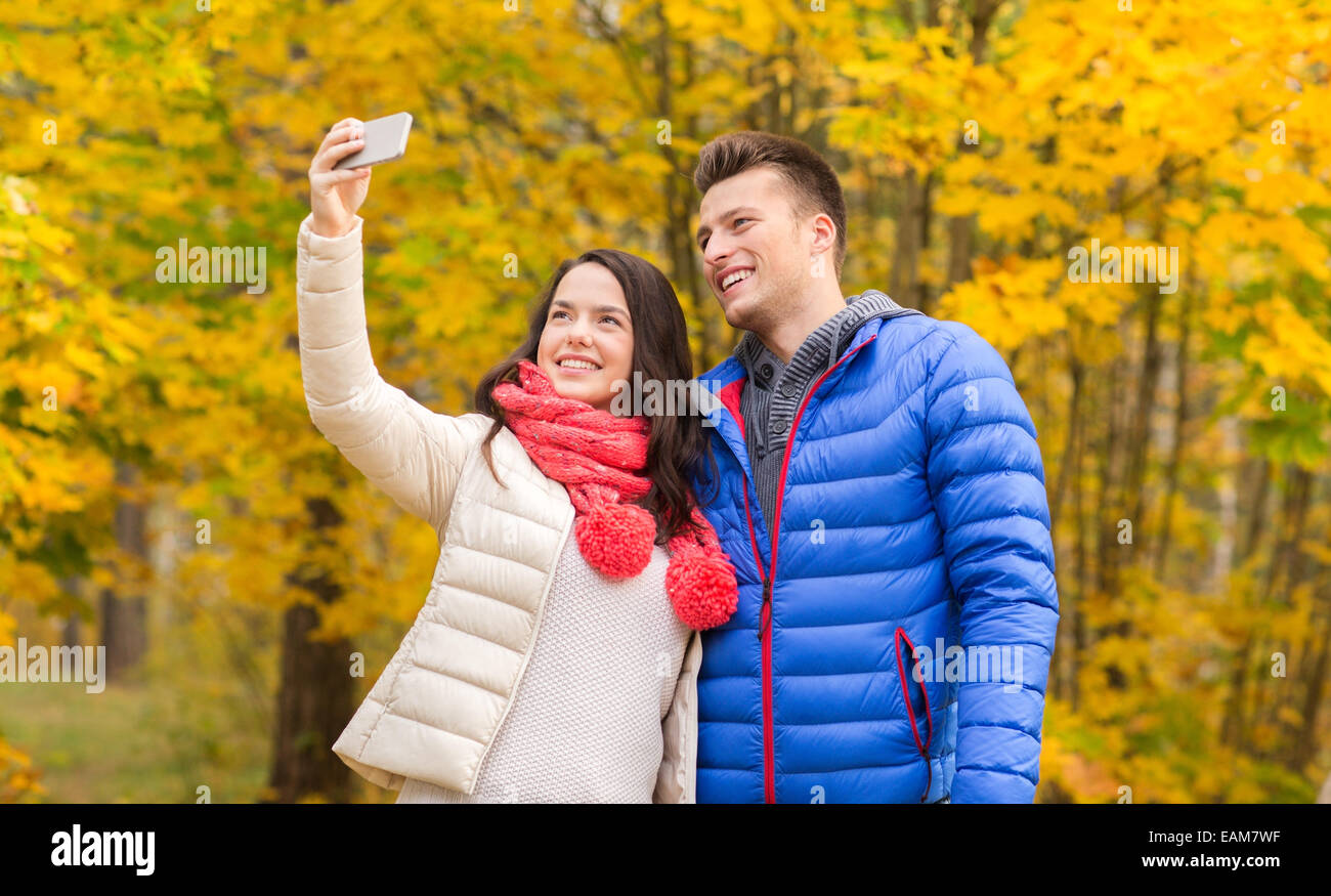 Teenage couple hugging in park hi-res stock photography and images - Alamy