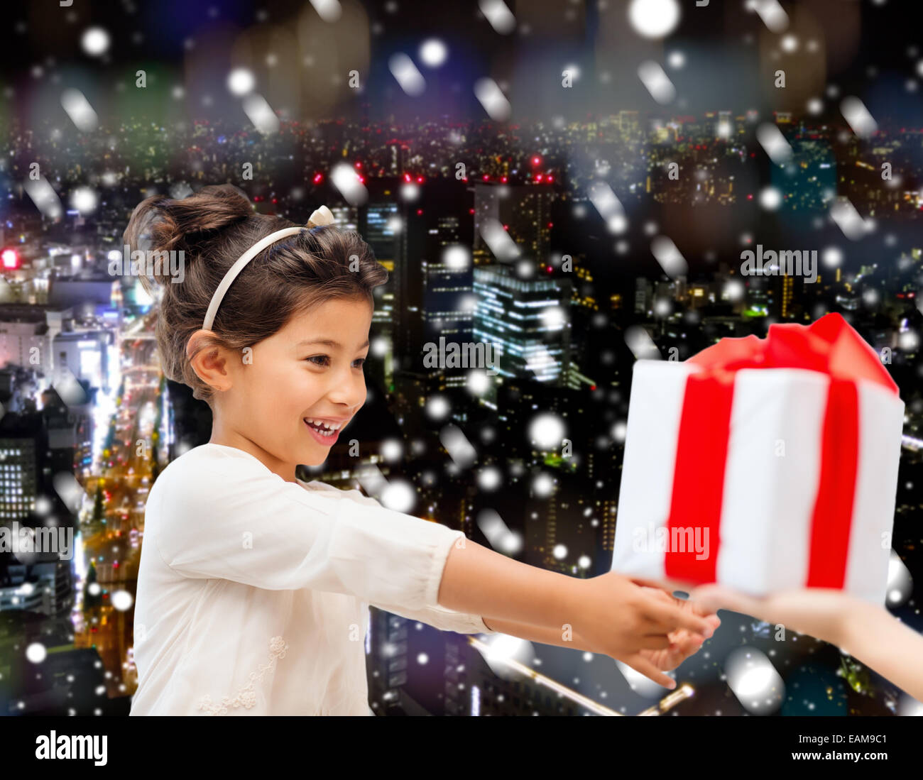 smiling little girl with gift box Stock Photo - Alamy