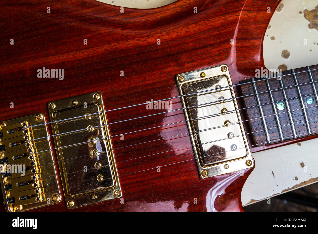 A custom made Guitar from exotic wood Padouk with Gold hardware Stock