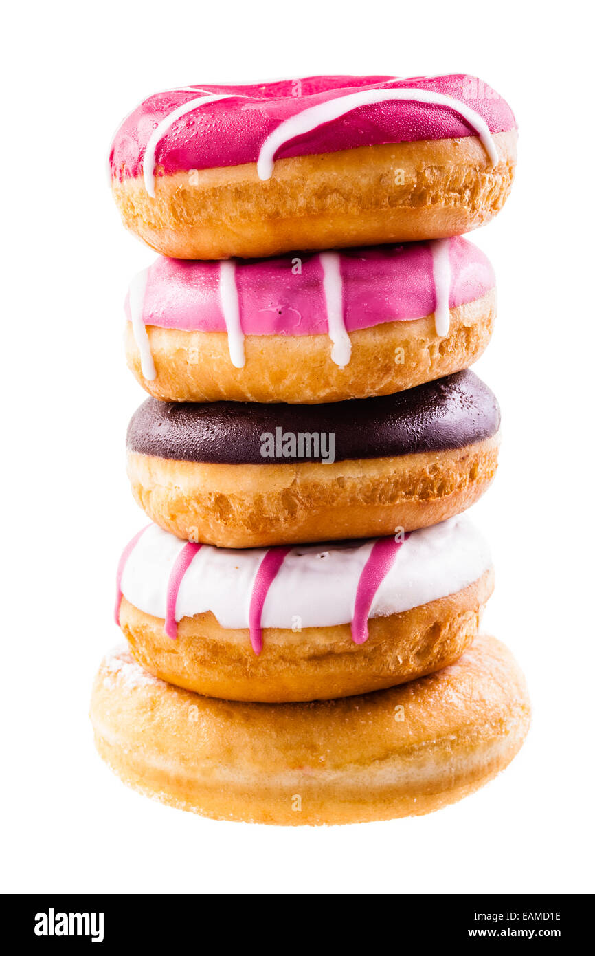 a tower of delicious donuts isolated over a white background Stock Photo
