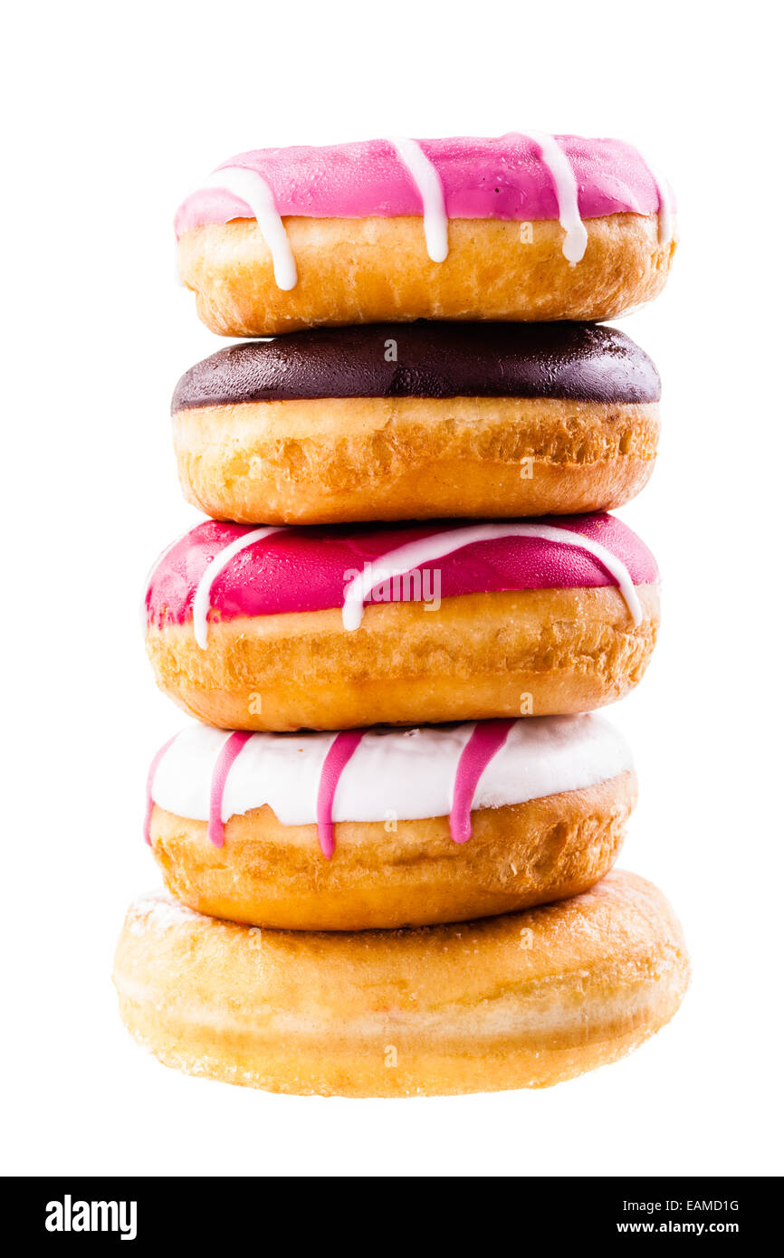 a tower of delicious donuts isolated over a white background Stock Photo