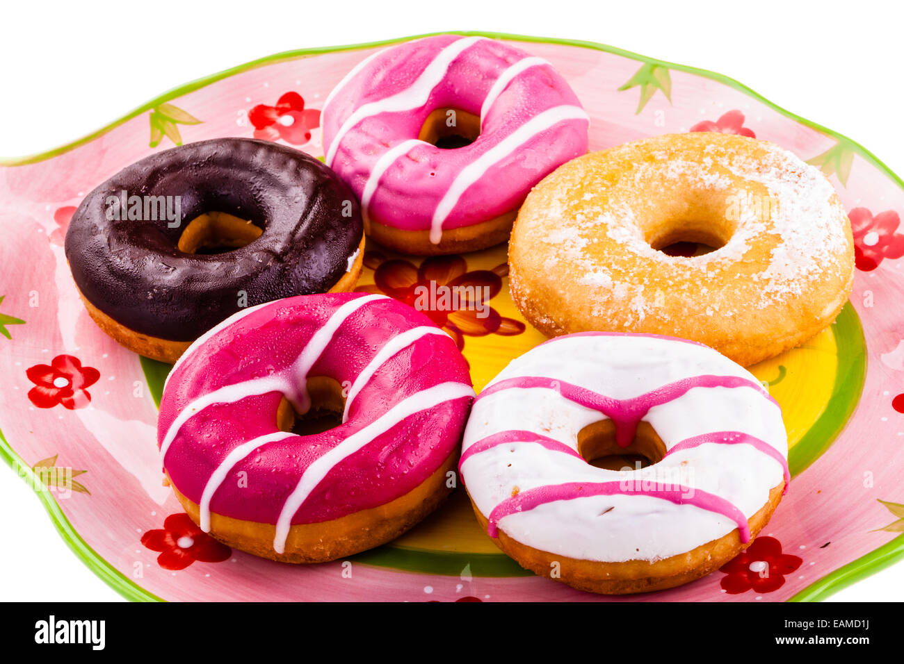 a collection of delicious and colorful donuts on a plate Stock Photo