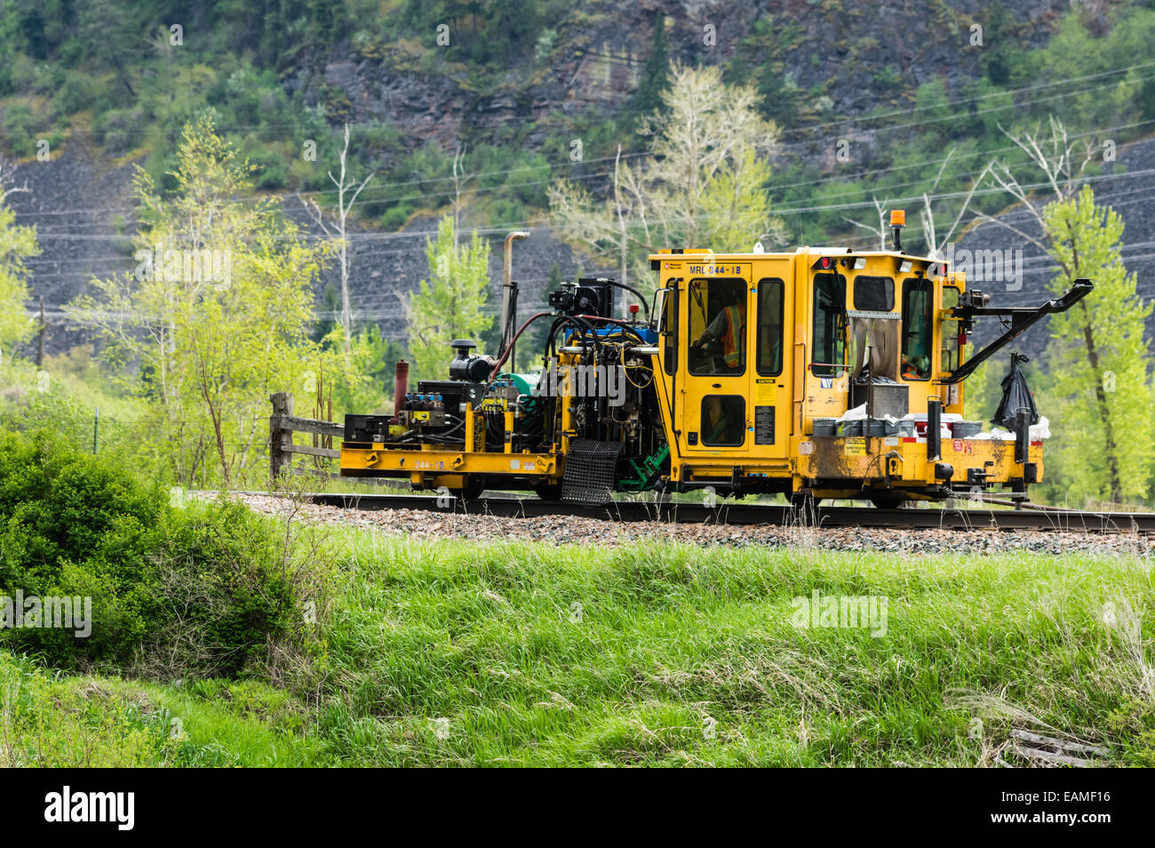 Railroad right of way maintenance equipment working on track in Montana