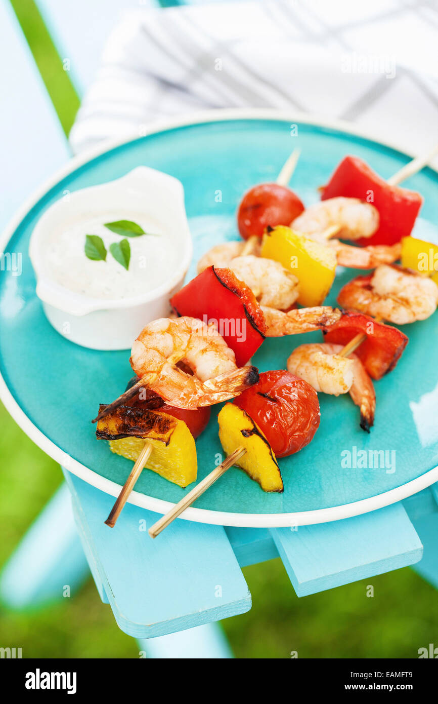 Shrimps and vegetables baked on grill outside Stock Photo Alamy