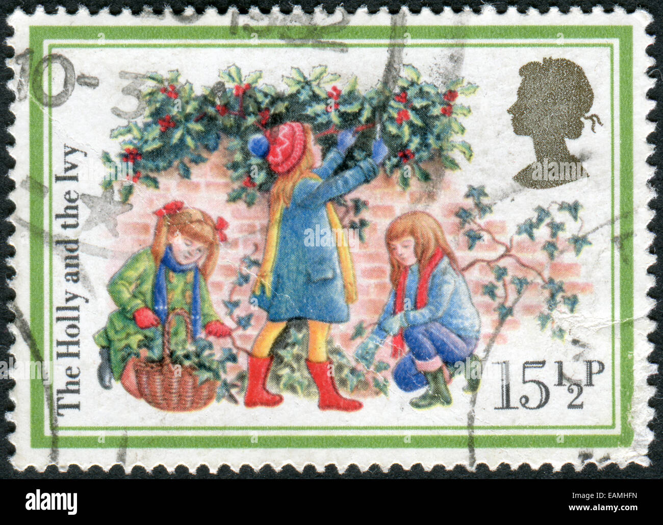 UNITED KINGDOM - CIRCA 1982: Postage stamp printed in England, Christmas Issue, shows the Holly and the Ivy, circa 1982 Stock Photo