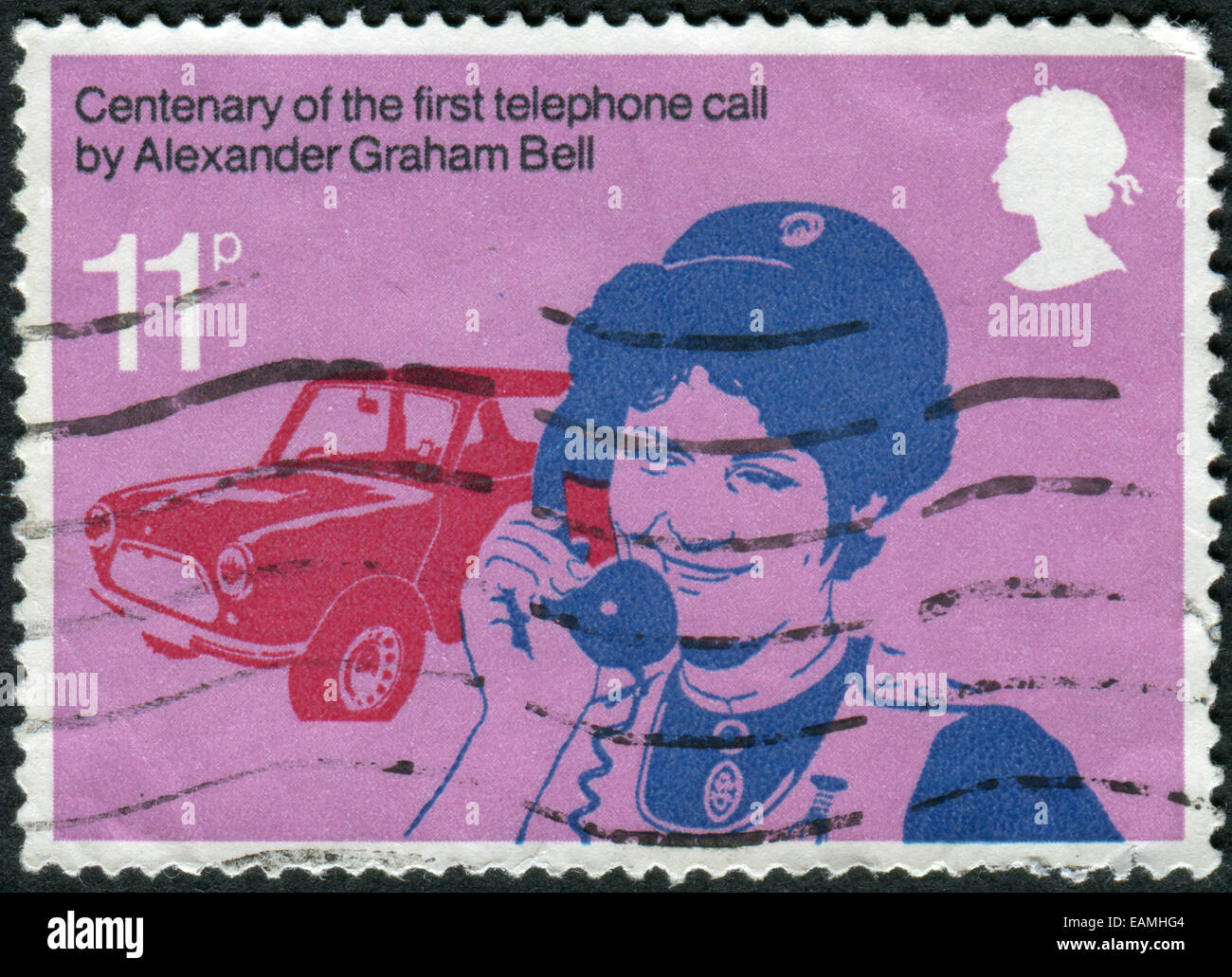 Stamp printed in England, devoted to 1st telephone call by Alexander Bell, shows a District nurse making social welfare call Stock Photo