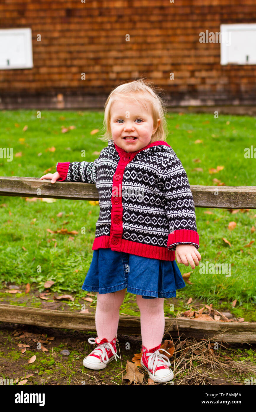 Lifestyle portrait of a young one year old child outdoors. Stock Photo