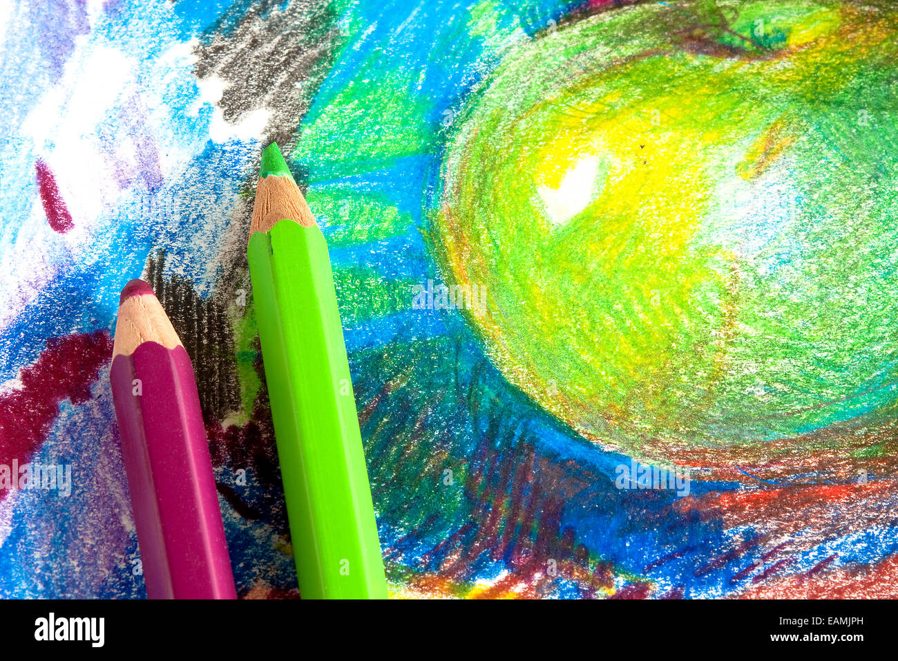 Child drawing by colored pencils Stock Photo