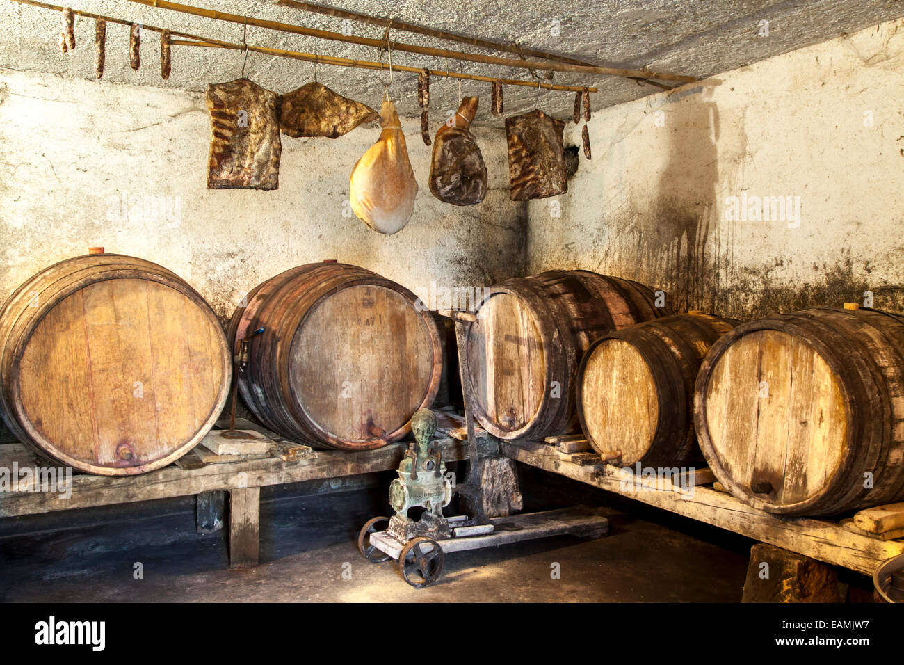 Interior of very old wine cellar with dried meat delicatessen Stock Photo
