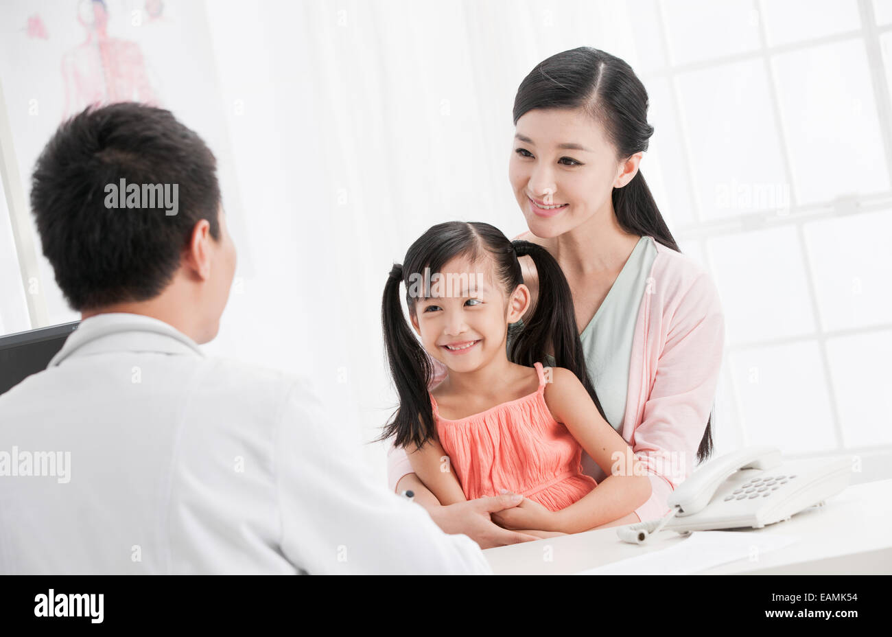 Mother Accompanied Her Daughter To Go See A Doctor Stock Photo Alamy