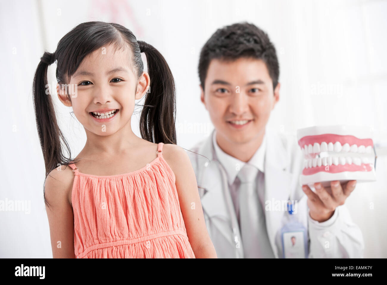 Oriental girls and dentists Stock Photo Alamy