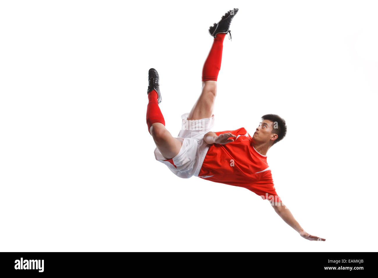 The football player handstand to play football Stock Photo